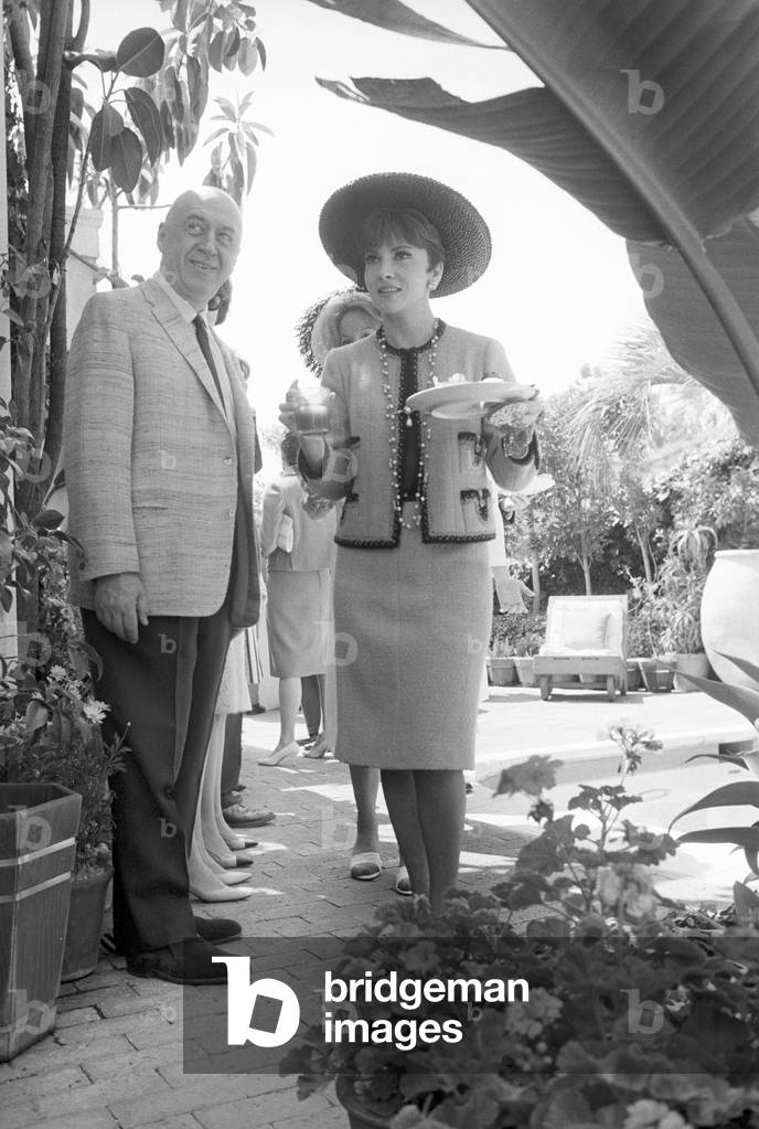 Gina Lollobrigida and Otto Preminger at breakfast in Hollywood (b/w photo)