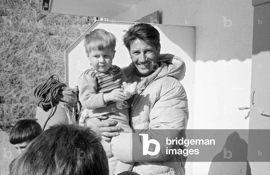 Walter Bonatti holding his friend's son, Zermatt, Switzerland