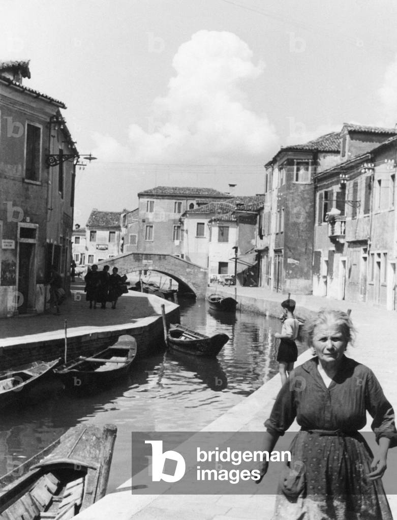 Glimpse of a canal of Burano, Venice, Italy