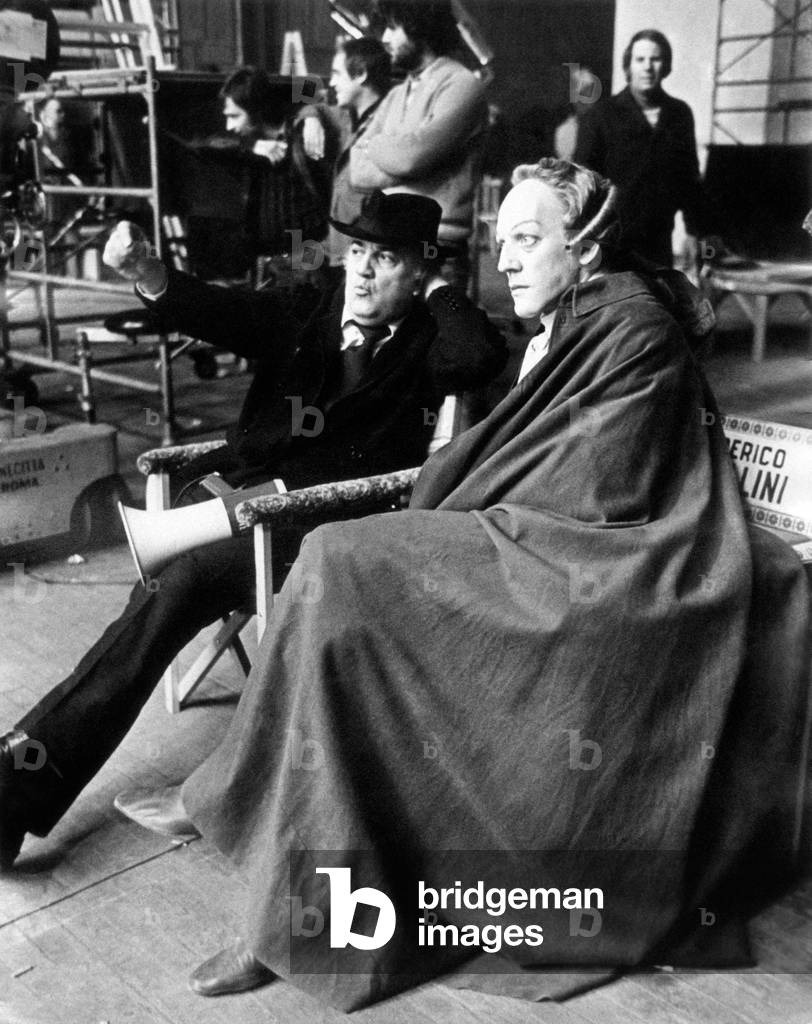 Federico Fellini and Donald Sutherland on the set of Fellini's Casanova, 1975 (b/w photo)