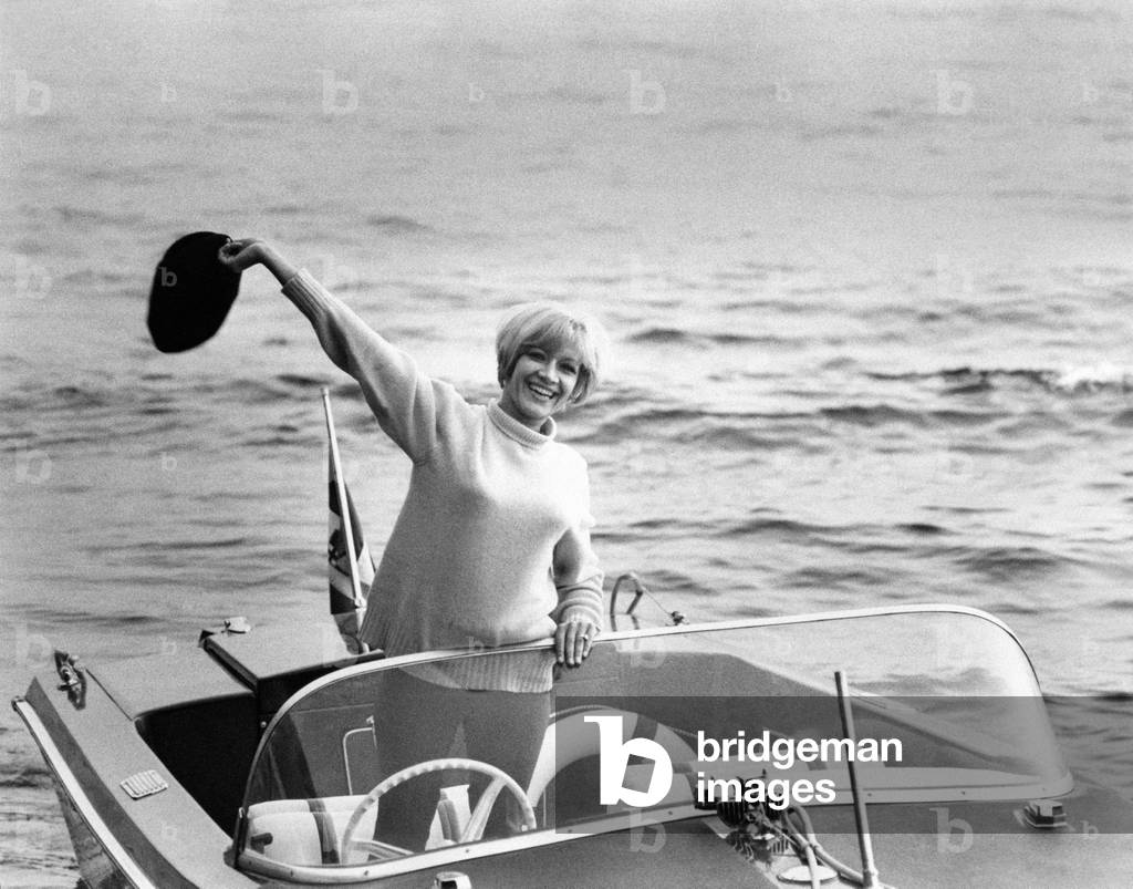 Gisella Pagano on a motorboat