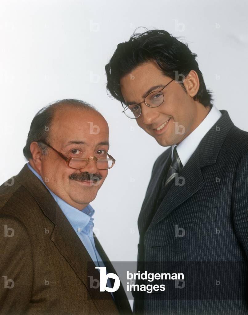 Portrait of Maurizio Costanzo and Rosario Fiorello wearing glasses