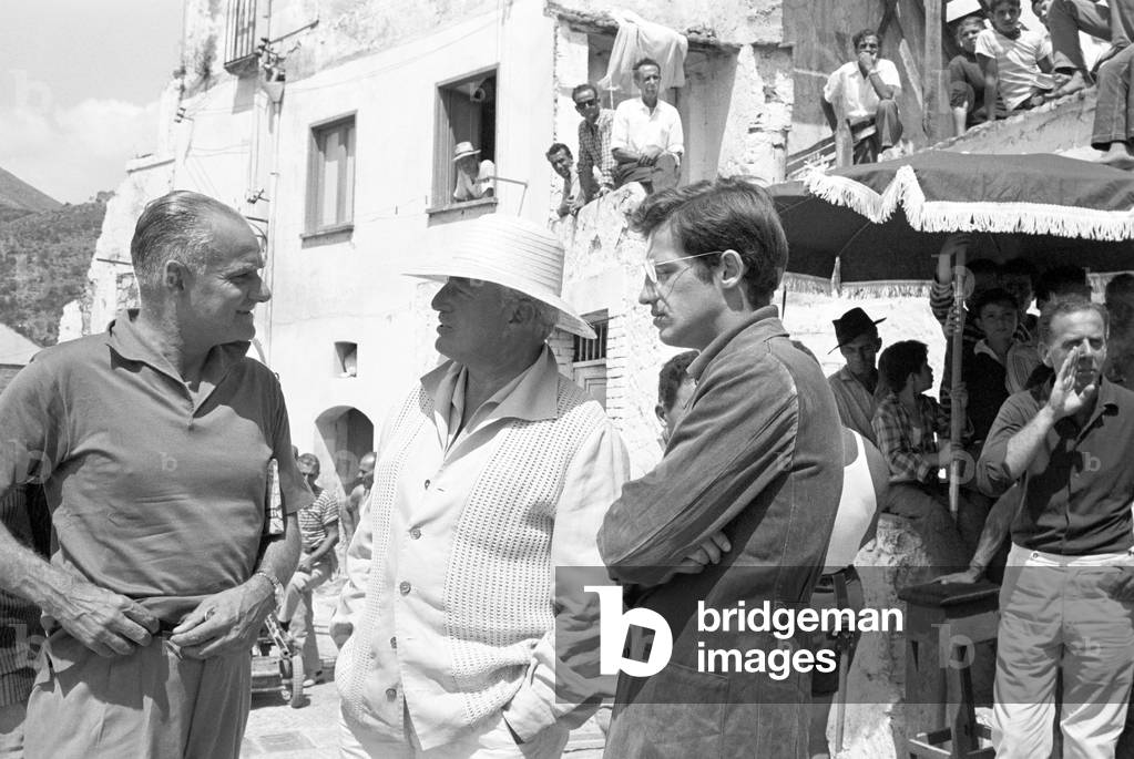 Vittorio De Sica, Jean-Paul Belmondo and Alberto Moravia on the set of Two Women, Italy, 1960 (b/w photo)