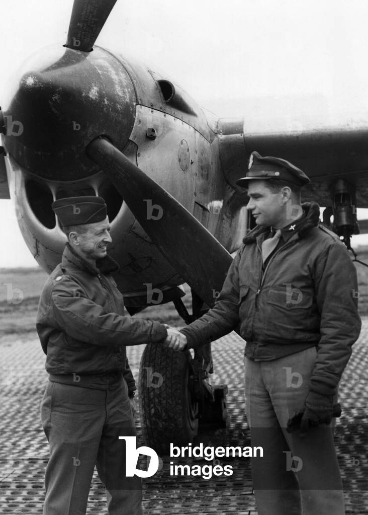 Charles Chitty and Mugh Griffith shaking their hands