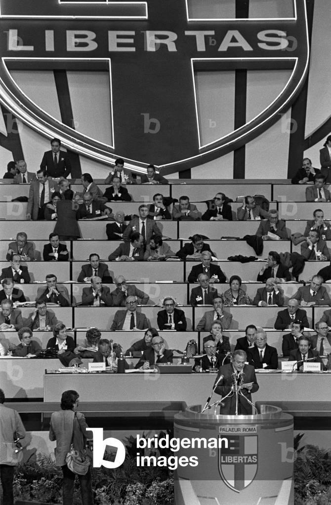 The bleachers for the christian democrat delegates below a huge crossed shield