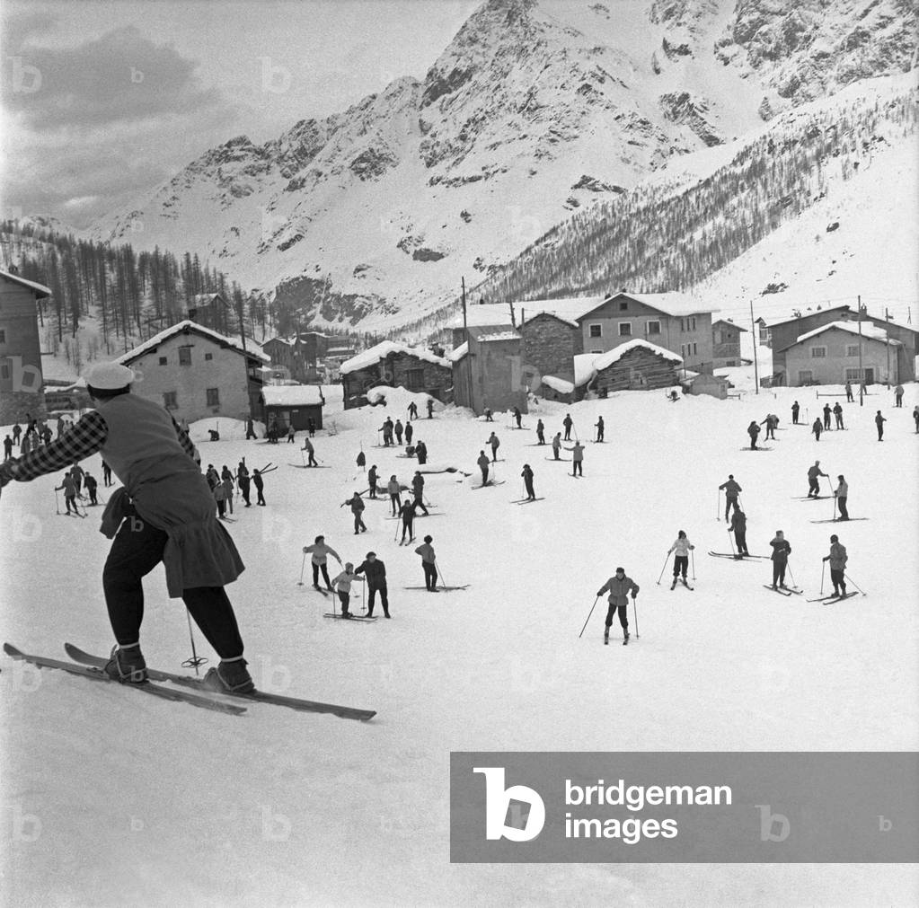 Skiers on holiday in Cervinia, Valtournenche, Italy