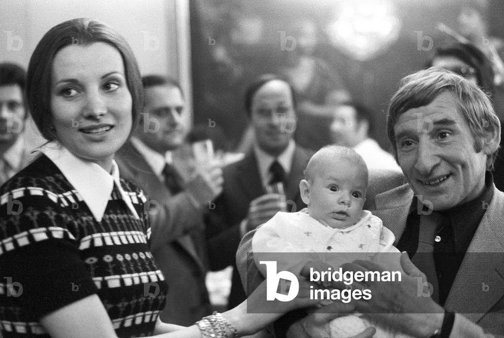 Renato Rascel and Giuditta Saltarini the day of their son's christening, Italy, 1973 (b/w photo)