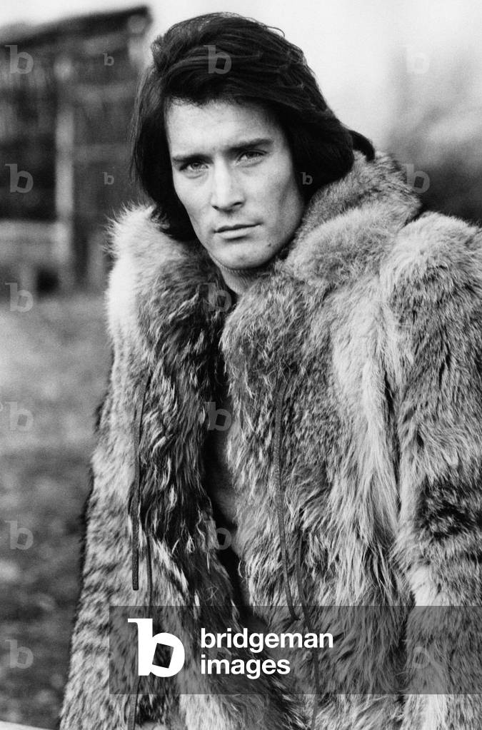 Stephen Forsyth wearing a fur coat