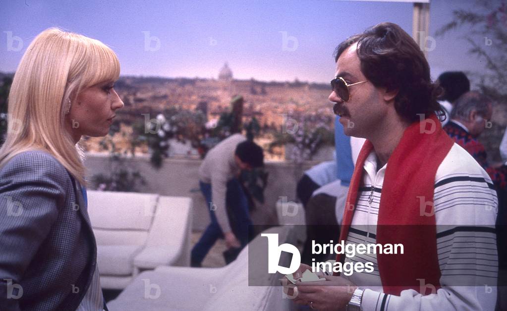 The Italian artist Raffaella Carrà together with her partner and director Sergio Japino, during the television broadcast, Pronto Raffaella, Rome, Italy, December 5th, 1985 (photo)