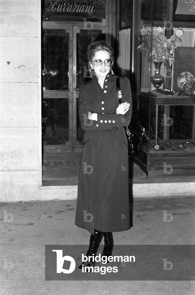 Mina coming out of a TV studio, Italy, 1971 (b/w photo)