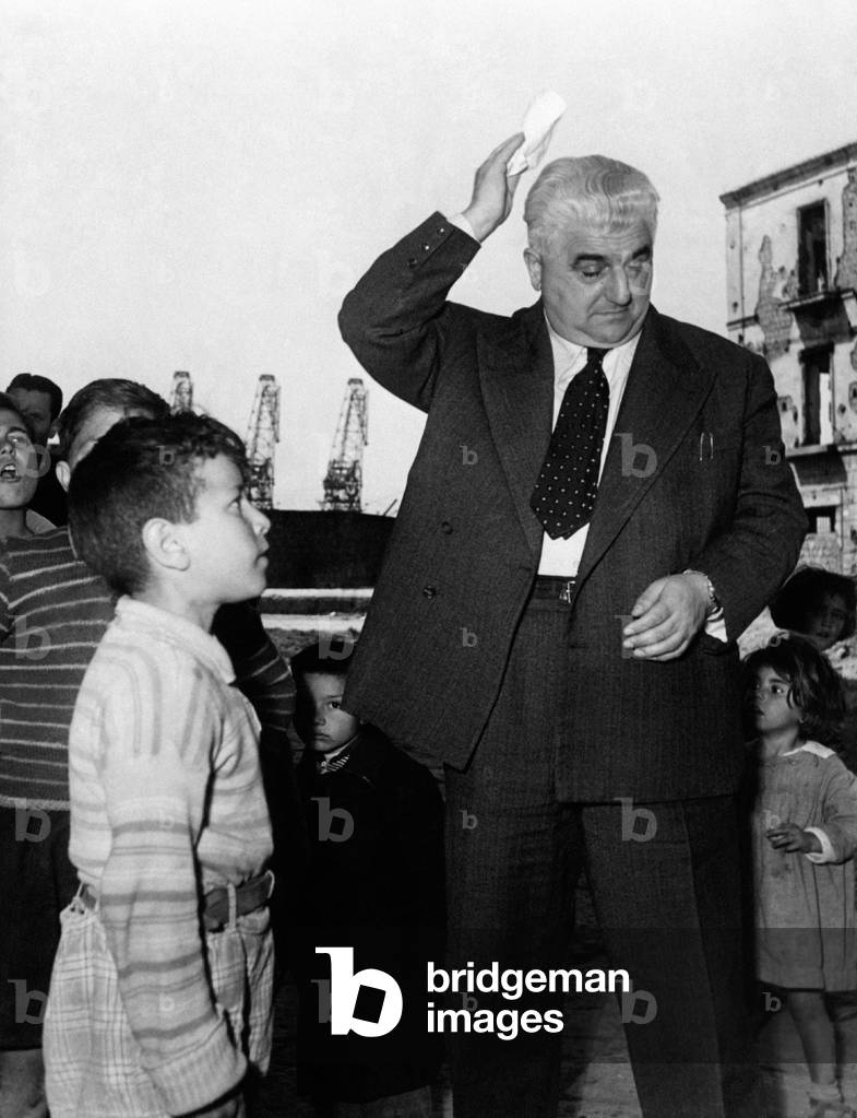 Giuseppe Dozza surrounded by children