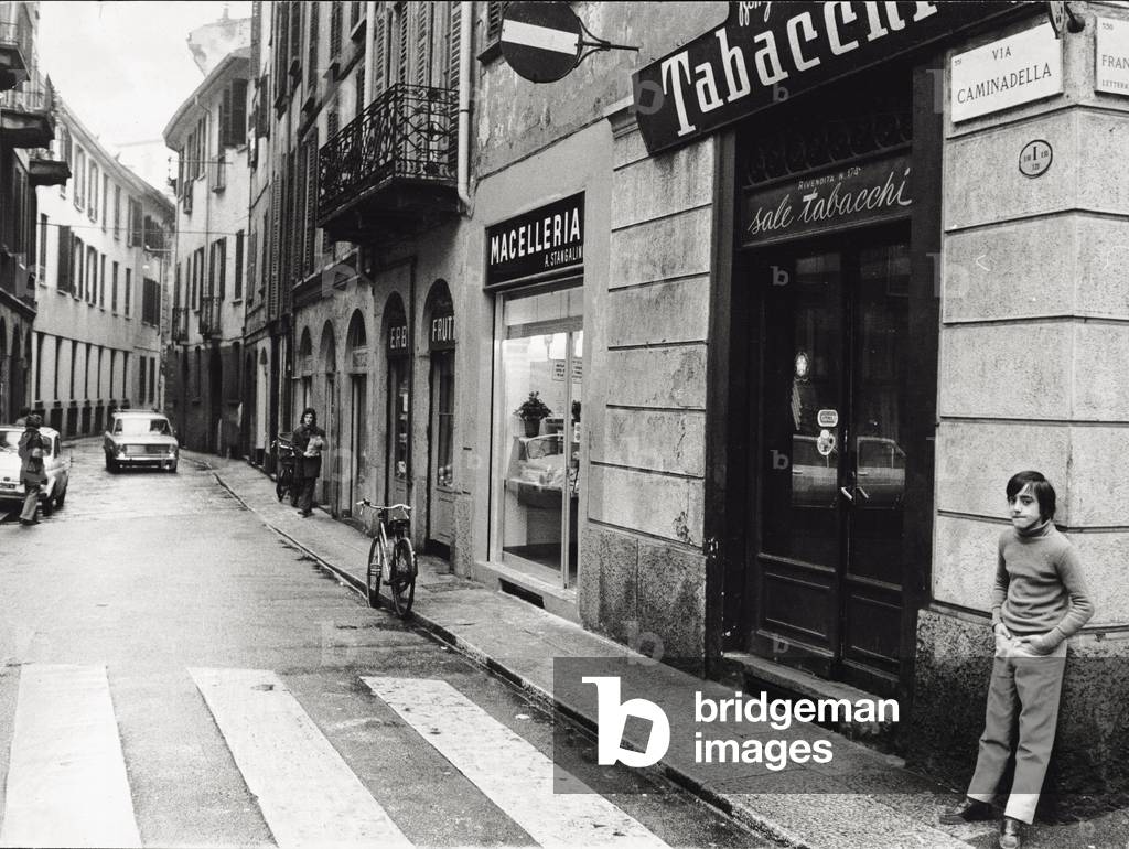 Passers-by in via Caminadella