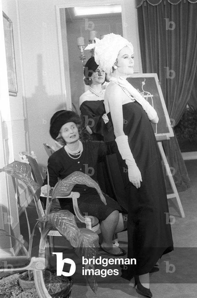 Biki together with two models