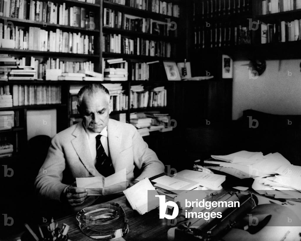 Writer Alberto Moravia in his office, Rome, Italy, 1962