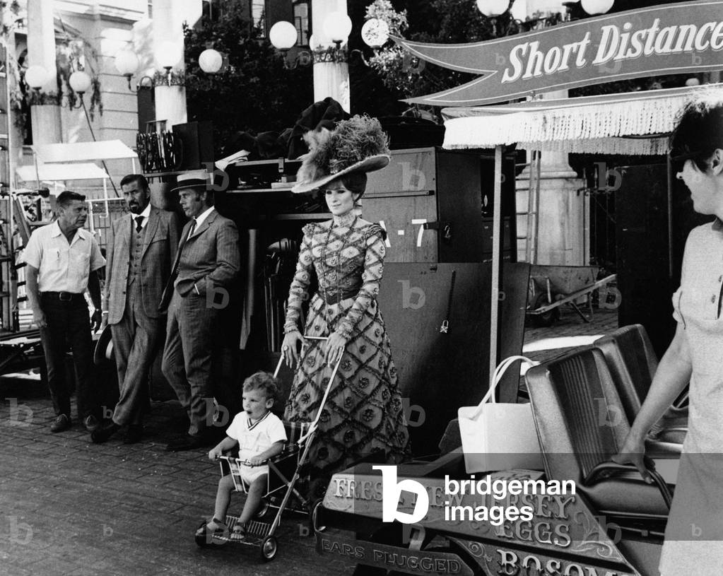 Barbra Streisand on the set of the movie Hello, Dolly with her son Jason Gould, 1968 (b/w photo)