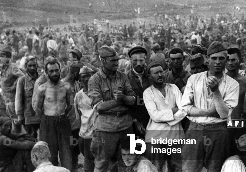 Soviet prisoners in a refugee camp, 1942 (b/w photo)