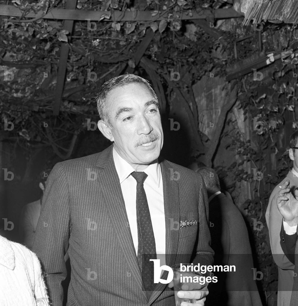 Anthony Quinn at a coctail party for The Secret of Santa Vittoria, 1968 (b/w photo)
