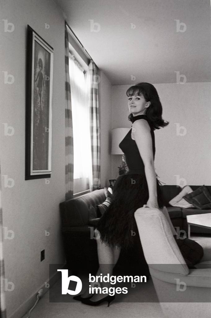 Jackie Collins posing, United Kingdom, 1964 (b/w photo)