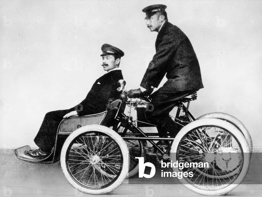 Giovanni Agnelli driving a quadricycle