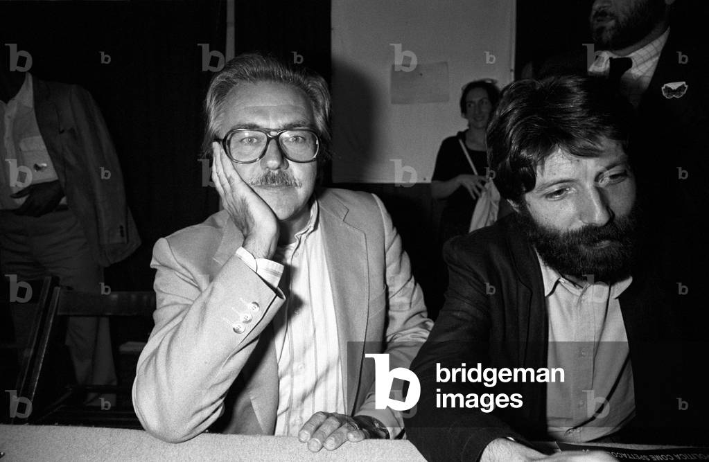 Alberto Asor Rosa sitting near Massimo Cacciari, Bologna, Italy, 1980