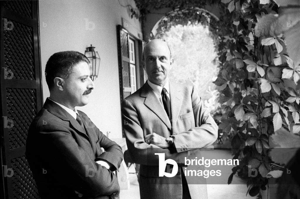 Umberto II of Italy smiling in company of Italian journalist Giorgio Torelli