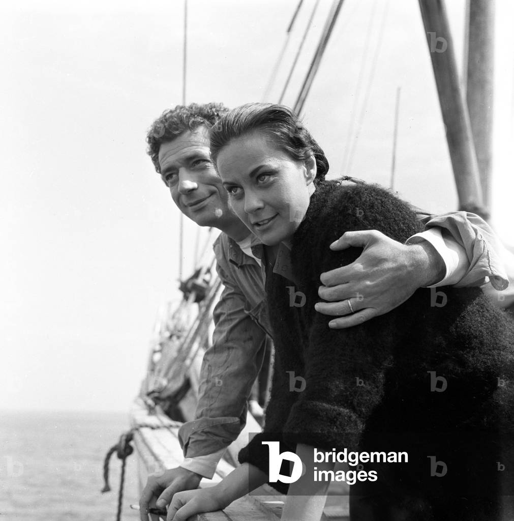 Alida Valli and Yves Montand on the set of 'The Wide Blue Road', Italy, 1957 (b/w photo)