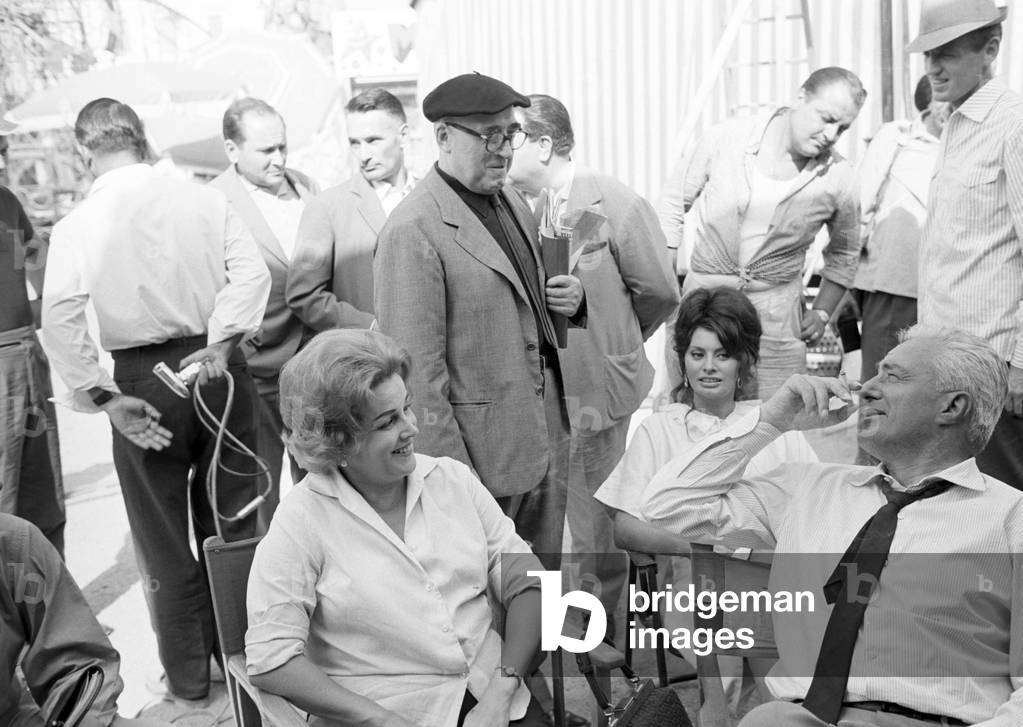 Cesare Zavattini, Vittorio De Sica, Maria Mercader and Sophia Loren on the set of Boccaccio '70, Italy, 1963 (b/w photo)