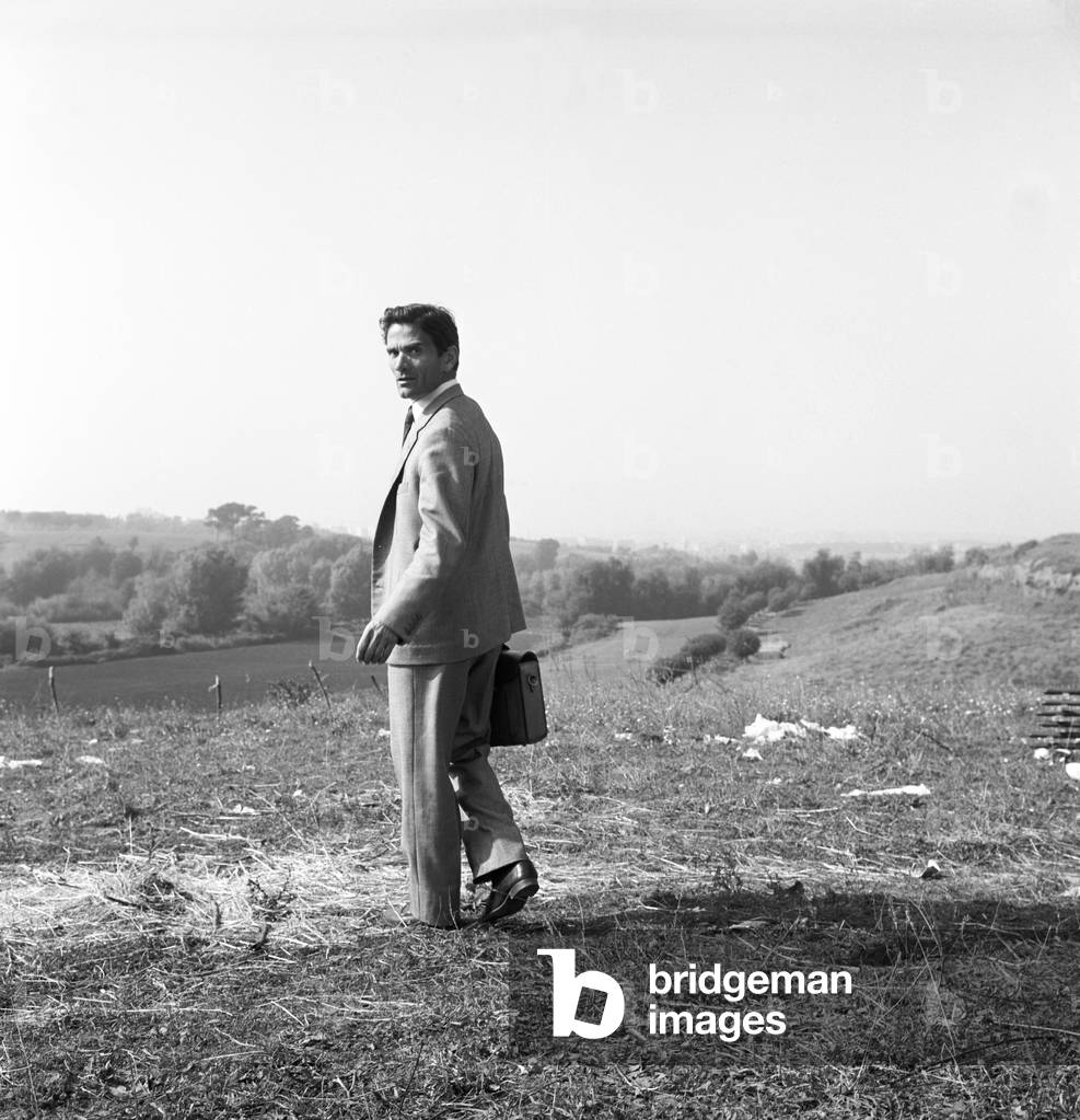 Pier Paolo Pasolini in the countryside, Italy, 1962 (b/w photo)