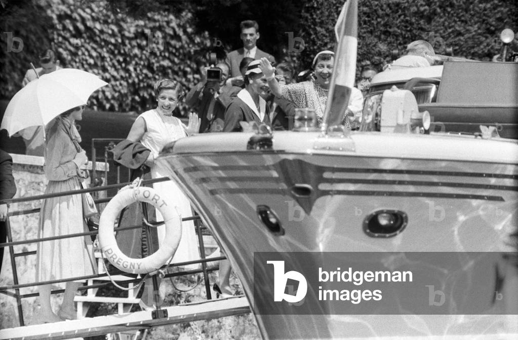 Clarissa Eden, Lucie Faure and Mamie Eisenhower getting on a boat during the Geneva Summit, Geneva, Switzerland