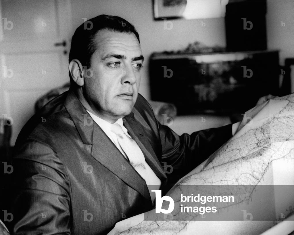 Raymond Burr with a road map, 1962 (b/w photo)