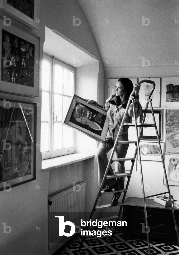 Laura Efrikian with a painting