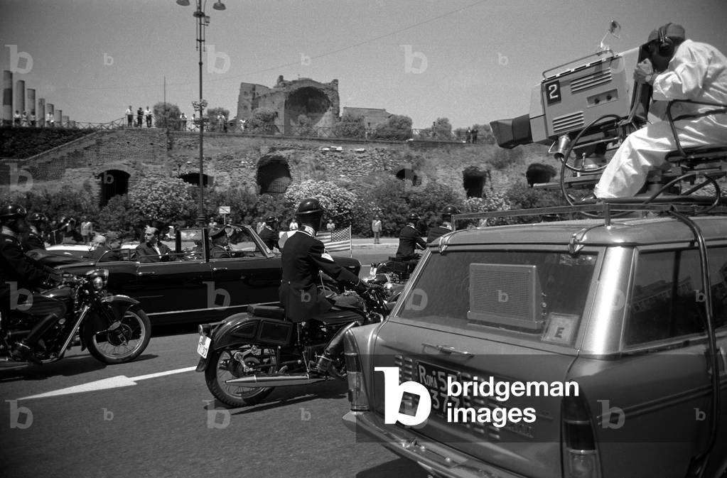 The procession of the President of the United States John Fitzgerald
Kennedy through the streets of Rome, Rome, Italy