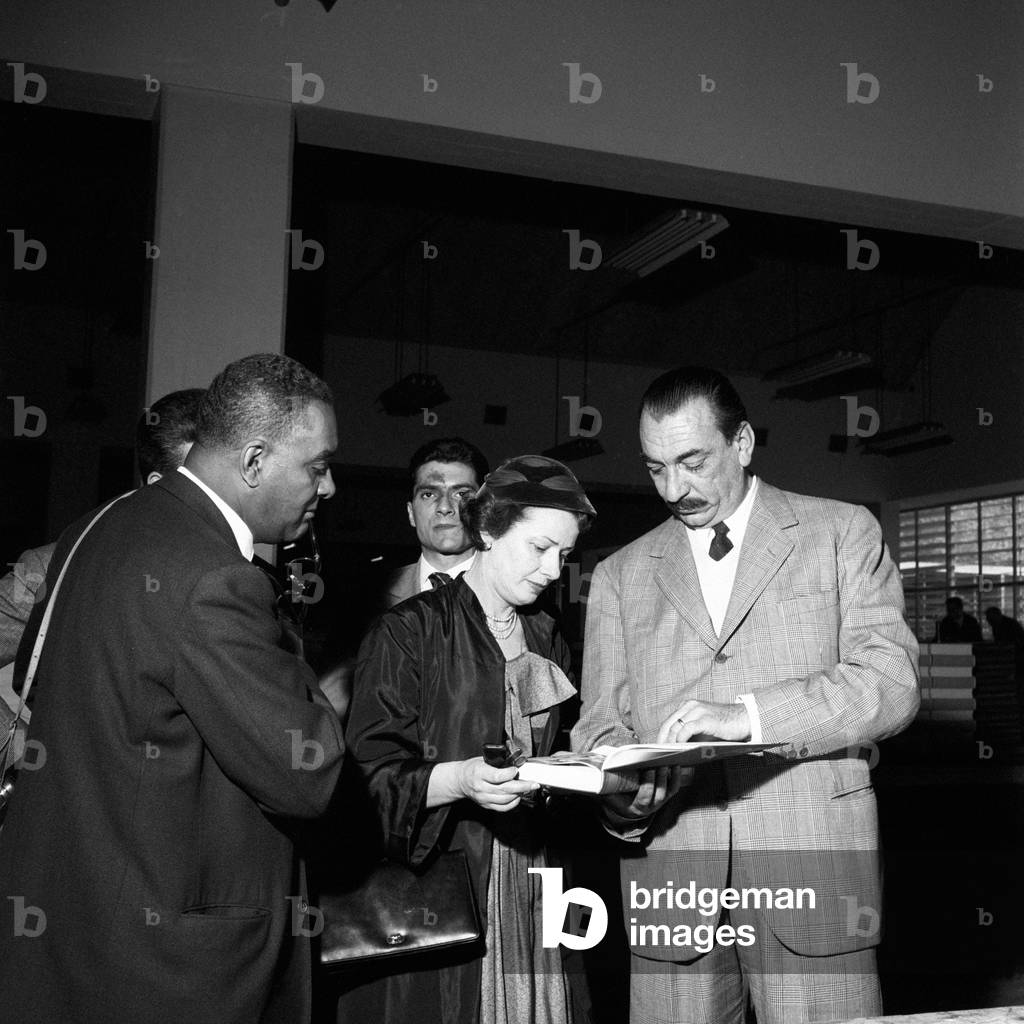Richard Wright, his wife Ellen Poplar and Alberto Mondadori at Mondadori plant, Montecarlo, Italy, 1957