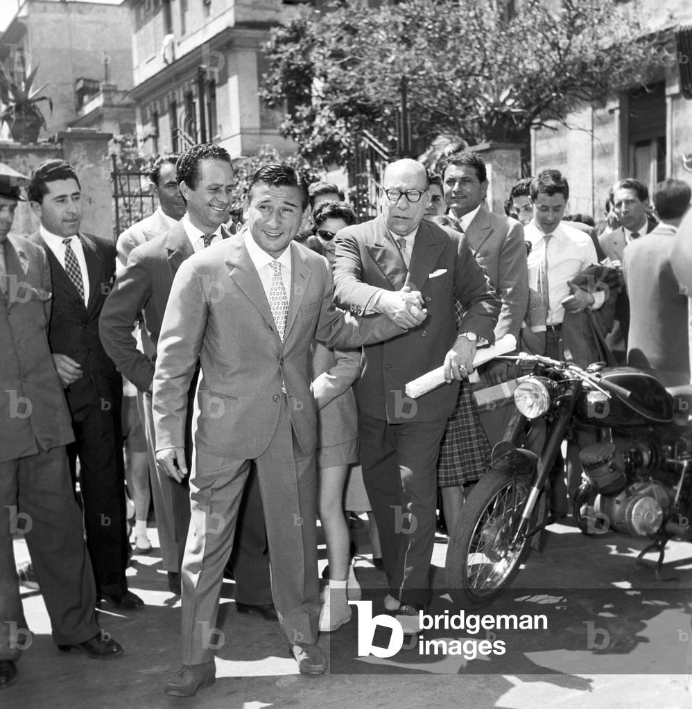 Renato Rascel hand in hand with his father Cesare Ranucci, Italy, 1954 (b/w photo)