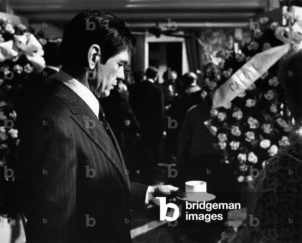 Charles Bronson at the funerals of Reina in a scene of the film The Valachi Papers