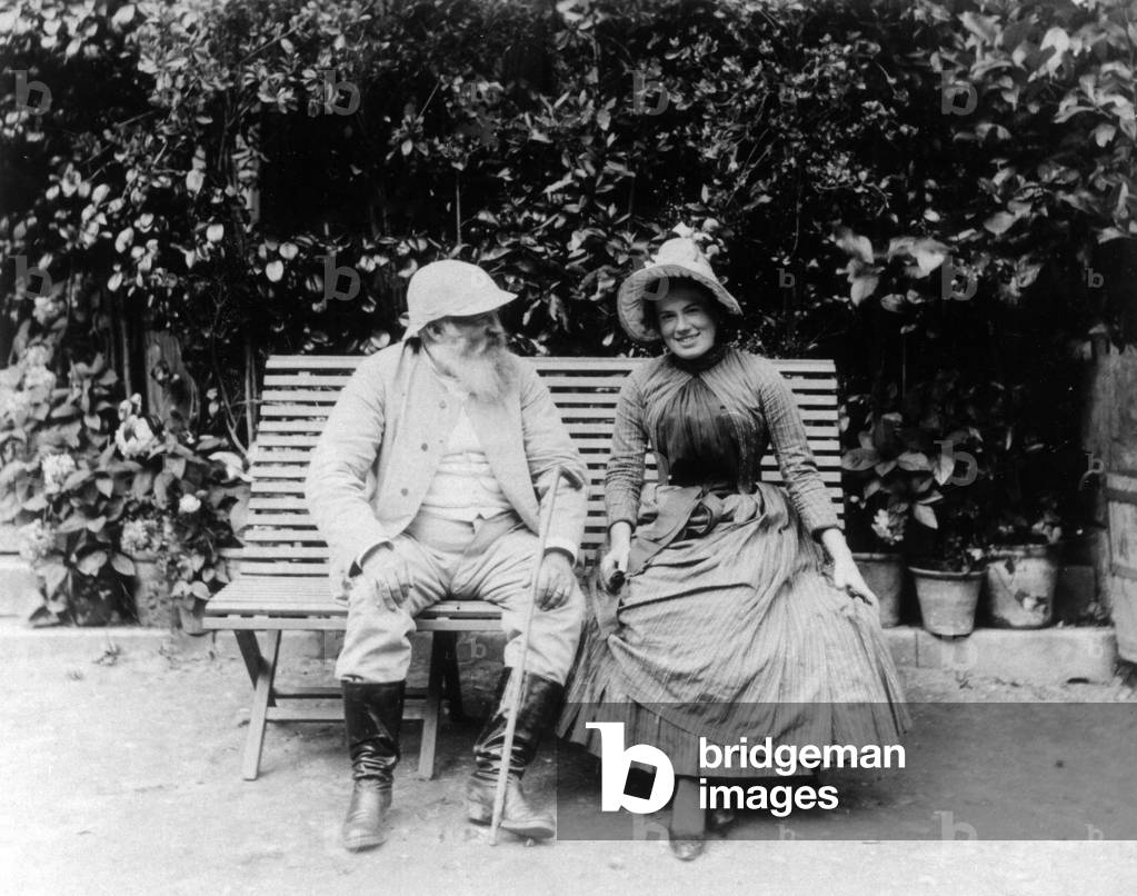 Leo Tolstoy with a young woman