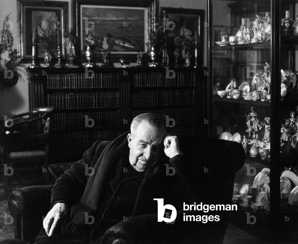 Aldo Palazzeschi sitting in an armchair