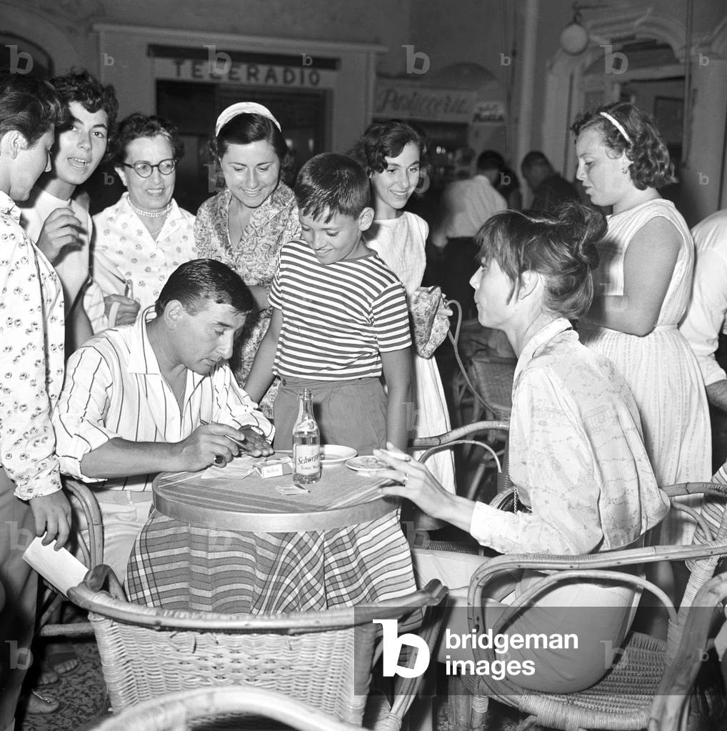 Renato Rascel and Elsa Martinelli on the piazzetta of Capri, Italy, 1955 (b/w photo)