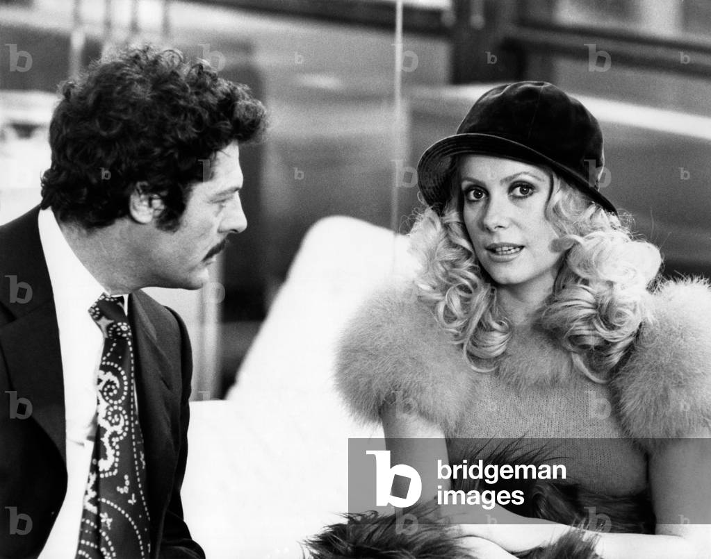 Marcello Mastroianni and Catherine Deneuve on the set of the film 'A Slightly Pregnant Man', 1973 (b/w photo)