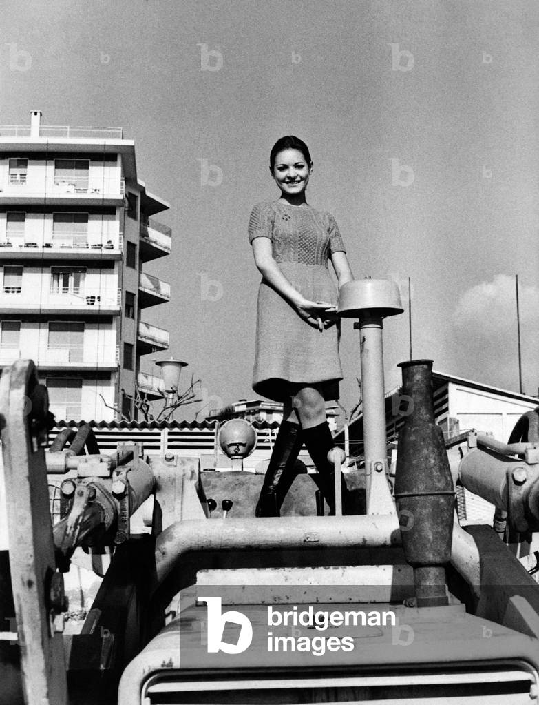 Anna Identici on an excavator