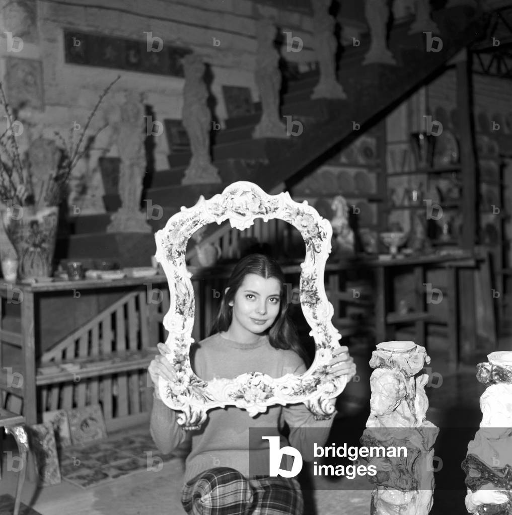 Jacqueline Sassard in a ceramic factory, 1957 (b/w photo)