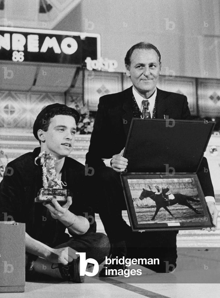 Eros Ramazzotti and Renzo Arbore prize winners during the 36th Sanremo Music Festival