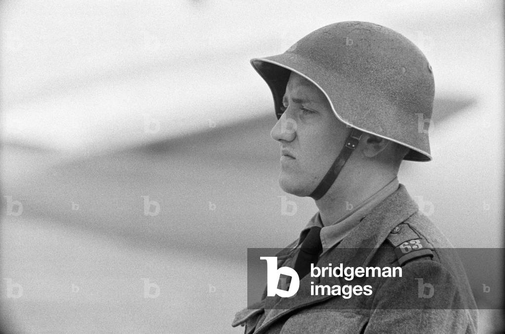 A military man patrolling the airport during the Geneva Summit, Geneva, Switzerland