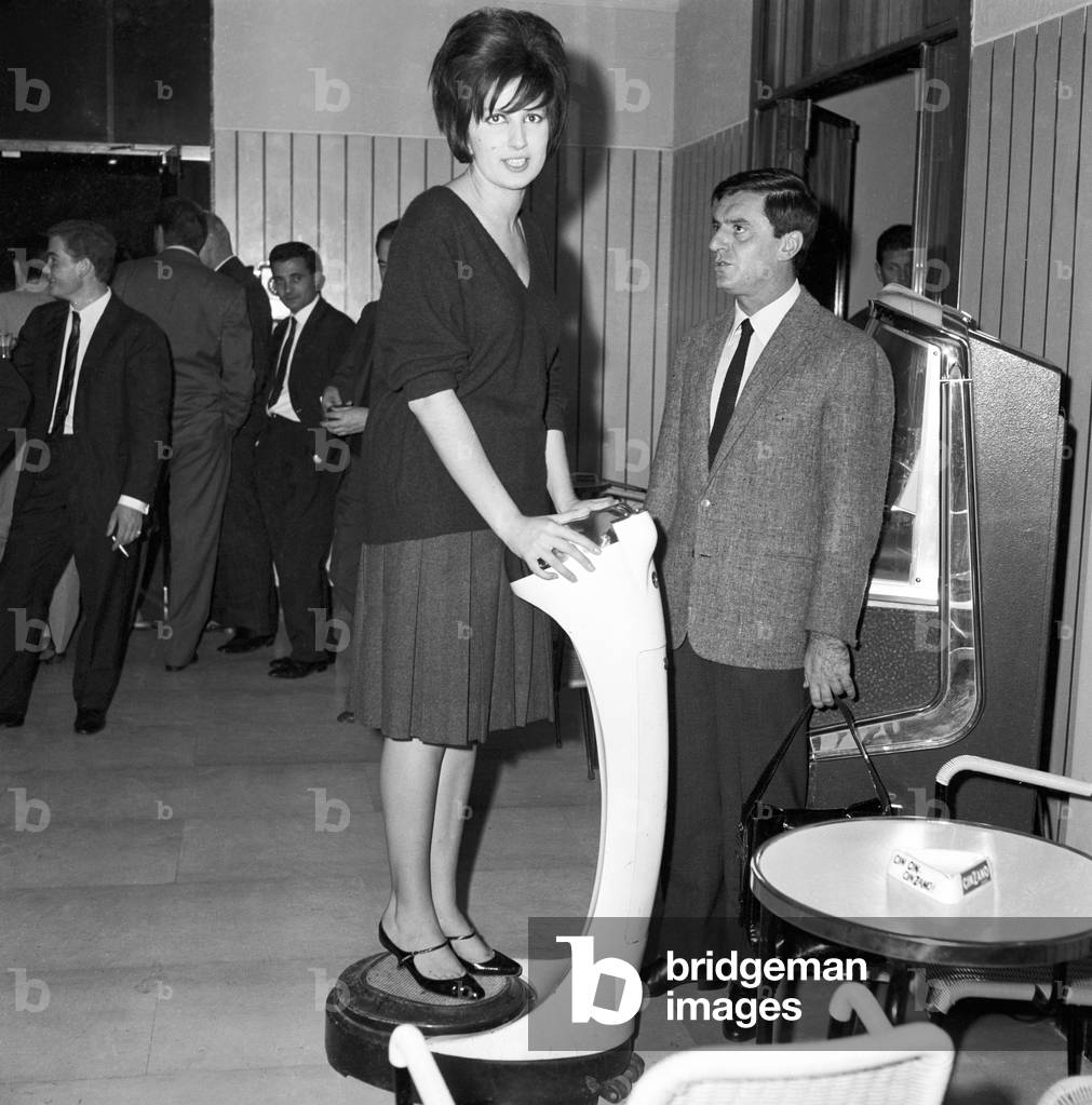 Mina and Lelio Luttazzi in the Rai café, Italy, 1962 (b/w photo)