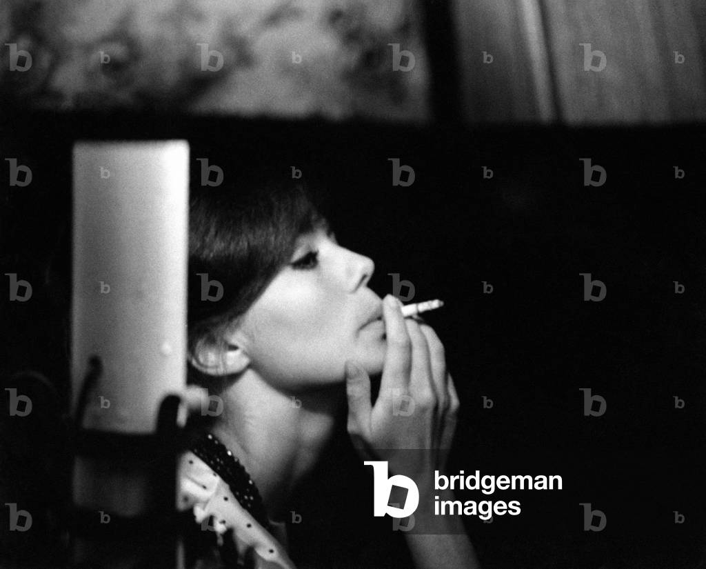 Giorgia Moll smoking a cigarette