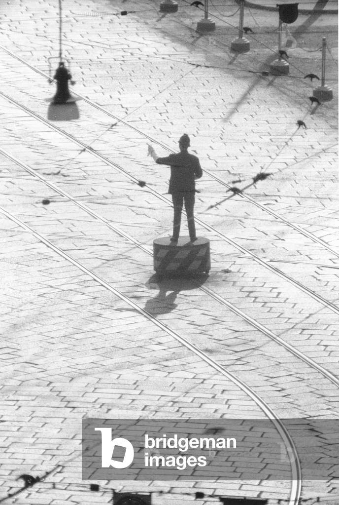 A traffic policeman, Italy, 1950 (b/w photo)