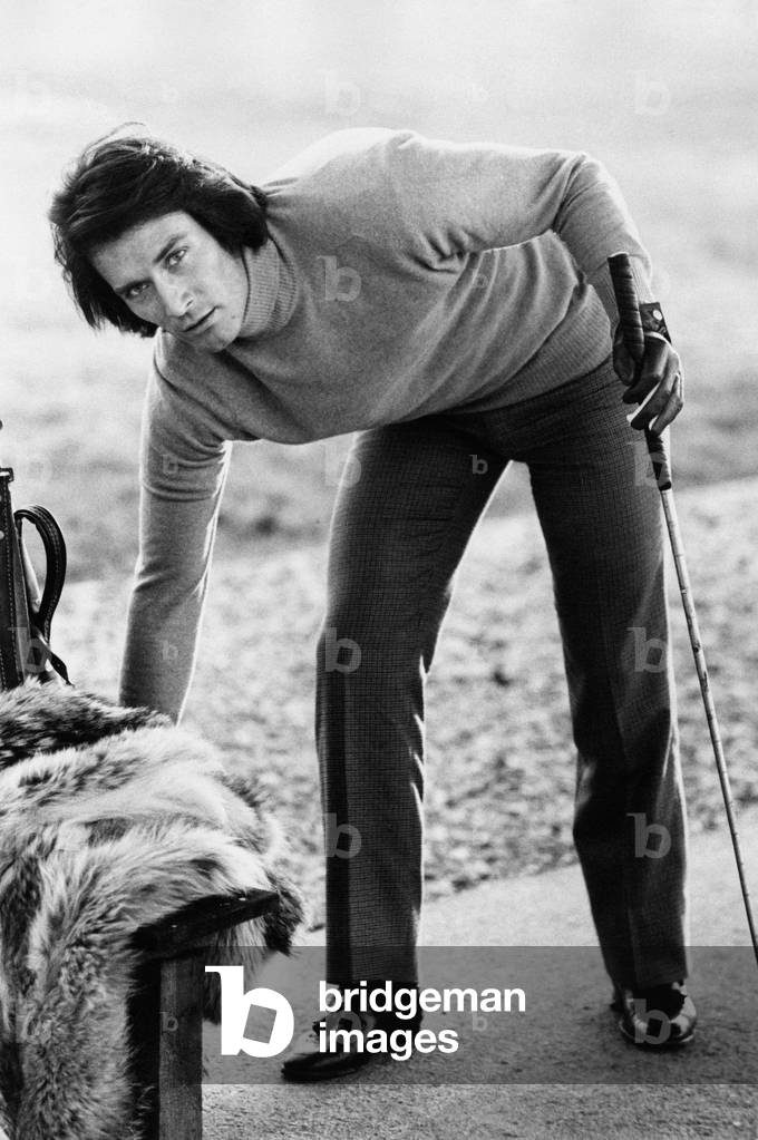 Stephen Forsyth holding a golf club