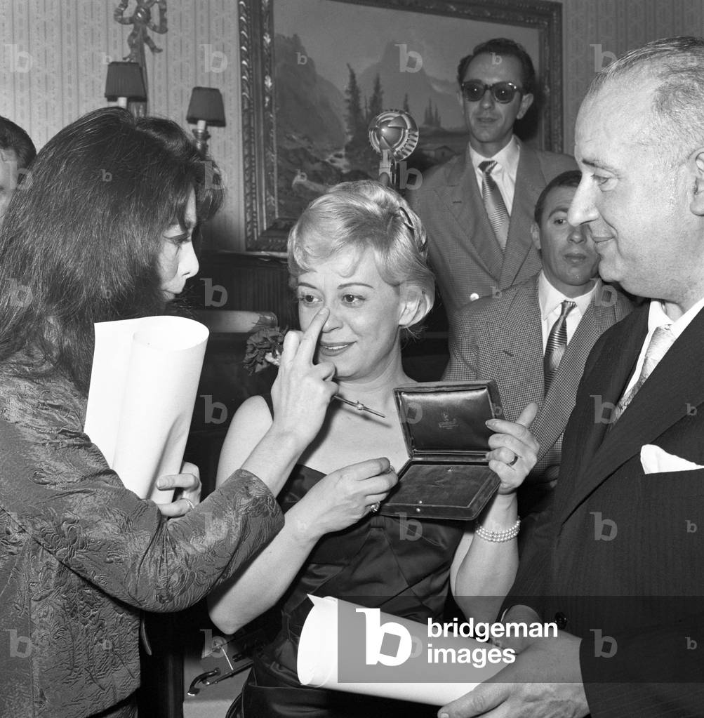 Giulietta Masina and Juliette Gréco at a prize ceremony, Italy, 1959 (b/w photo)