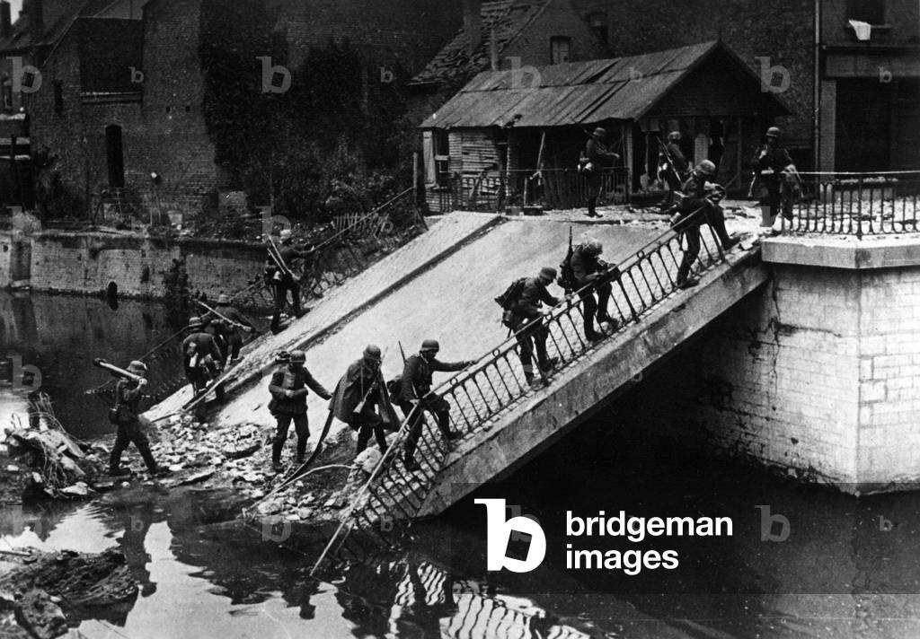 German soldiers on the ruins of a bridge