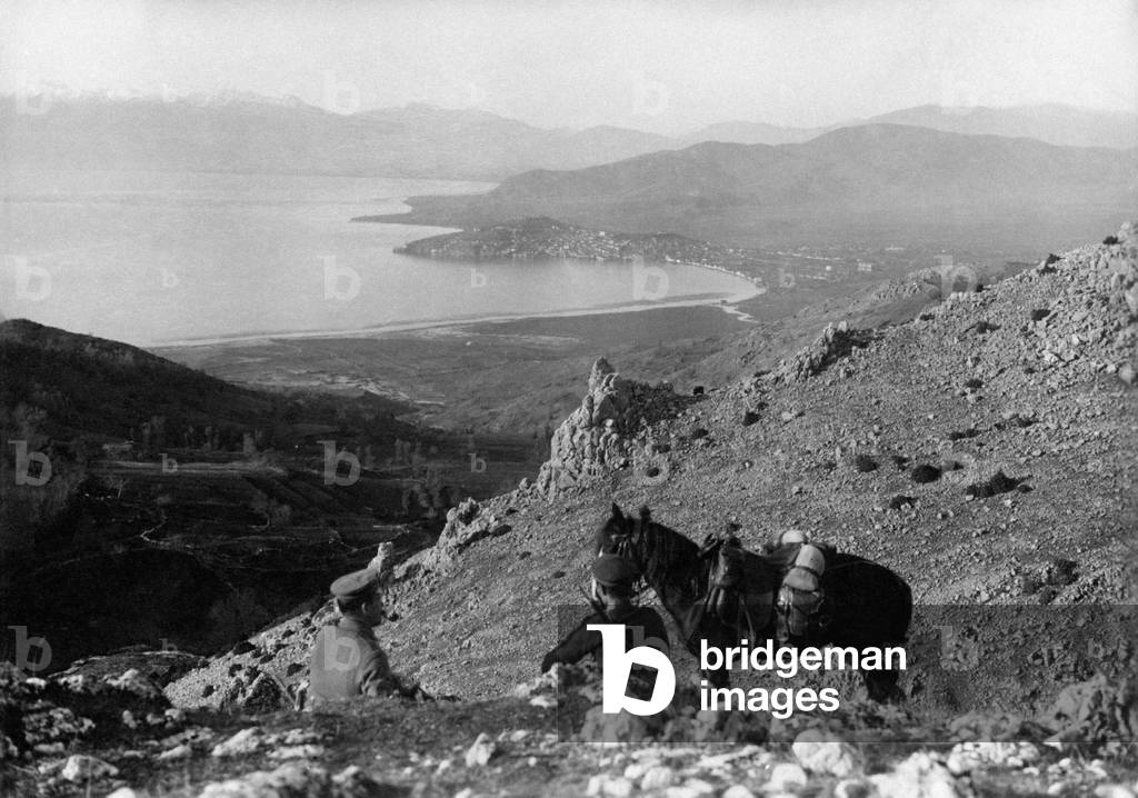 Two soldiers resting near the Ohrid lake